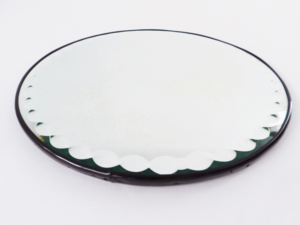 Round chiseled mirror